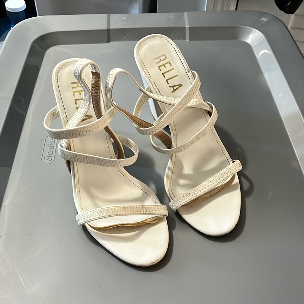 Previously owned white heel